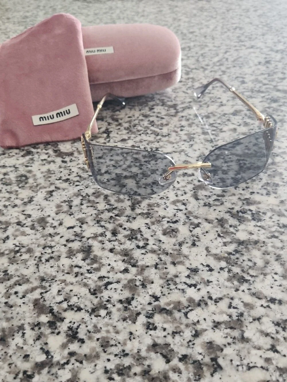 Miu Miu Gold and Black Rimless Sunglasses with Pink Velvet Case